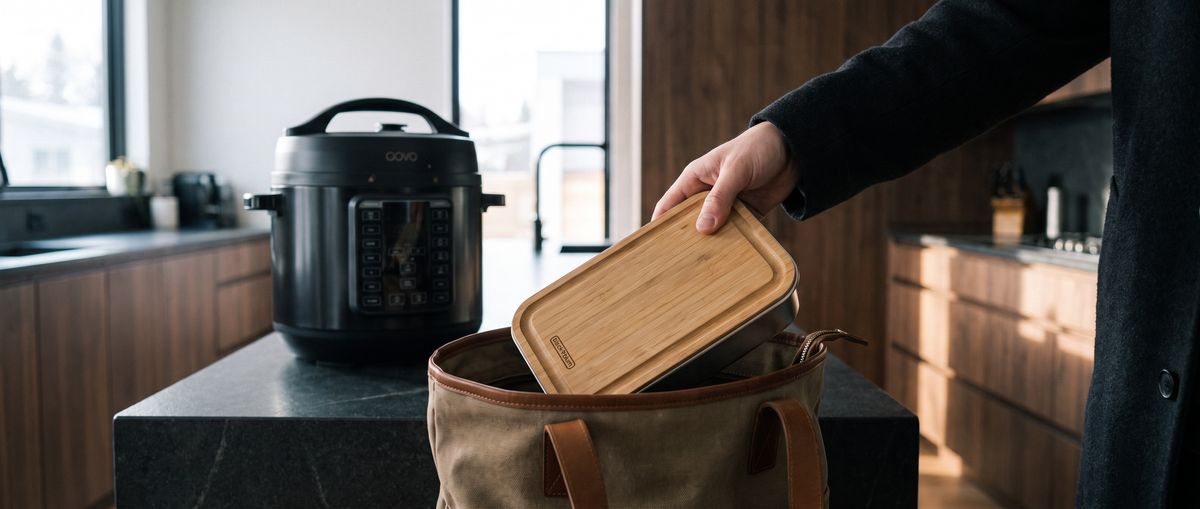 Packing a Q-Chef meal prep lunch box into a bag before heading out